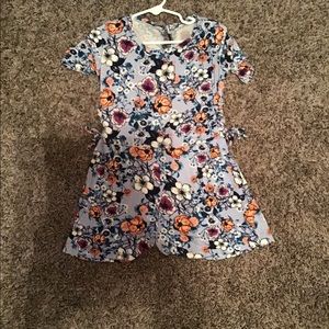 Blue jumpsuit with flowers